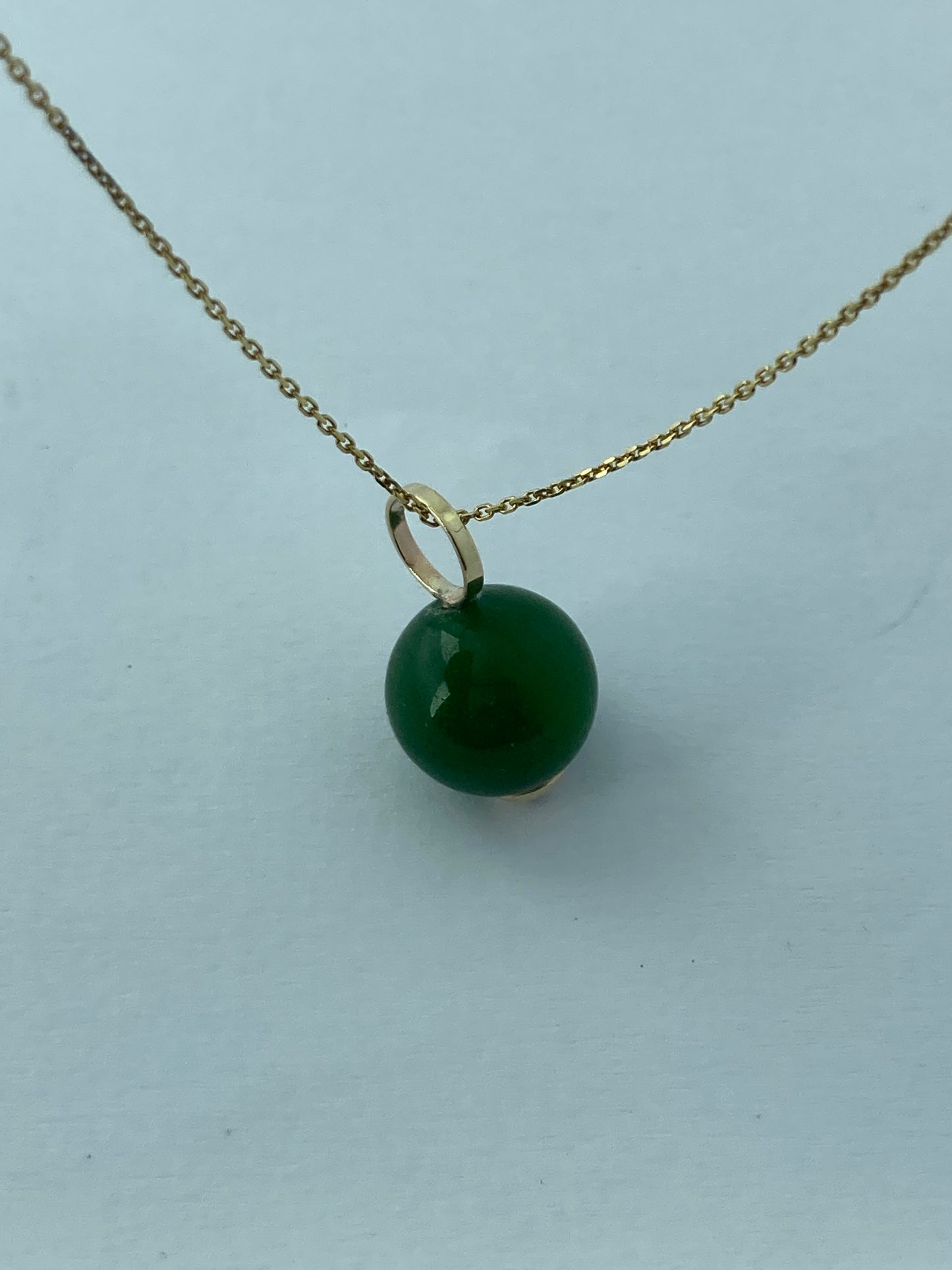 gold jade pendant, 18” chain