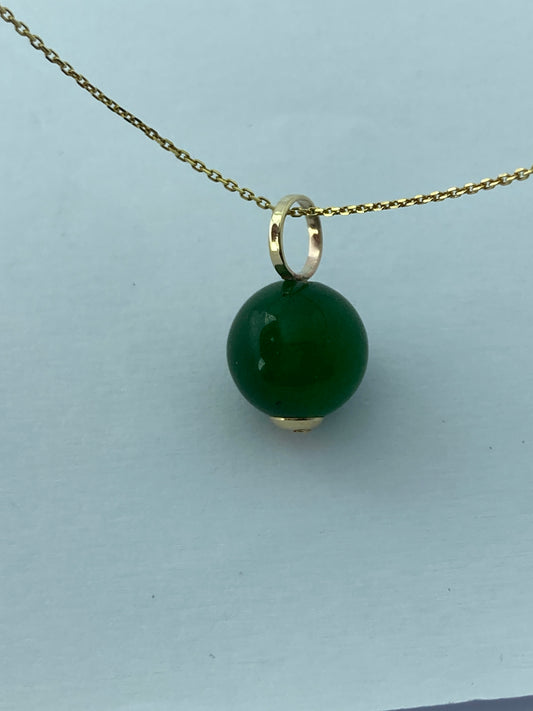 gold  jade pendant, 18” chain