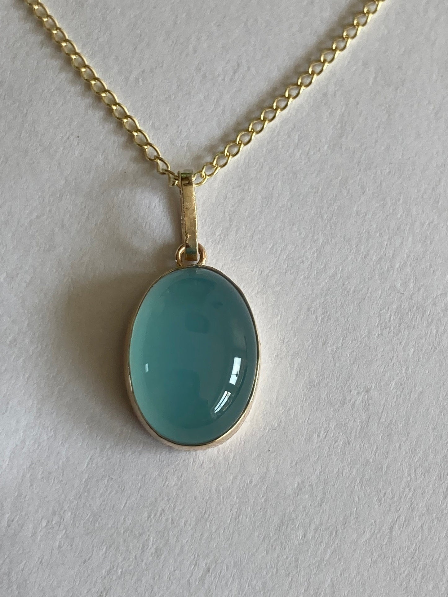9ct gold blue pendant