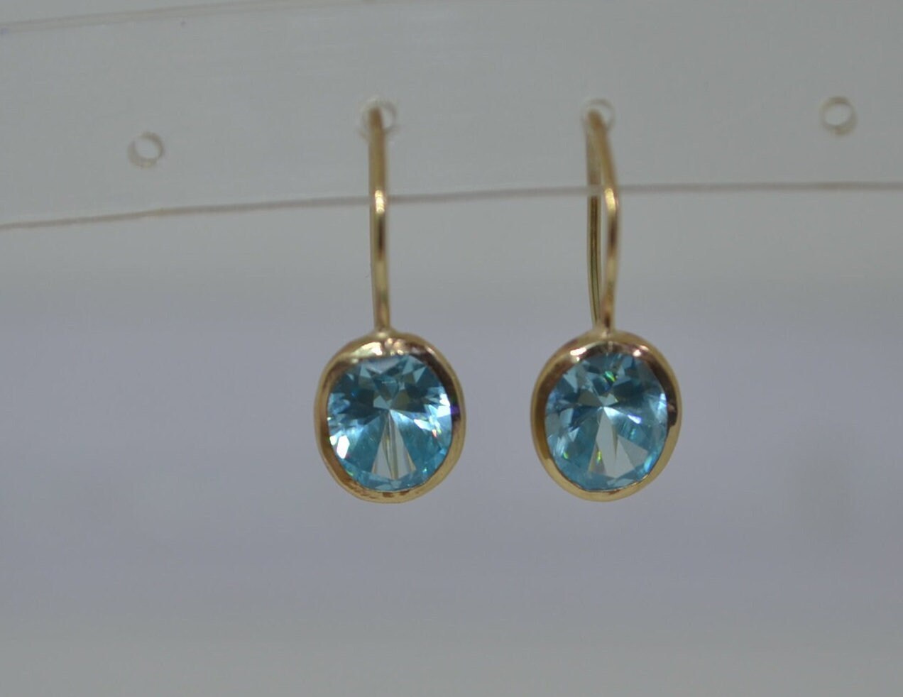 9ct gold earrings, blue Cubic zirconia, solid 9ct yellow gold