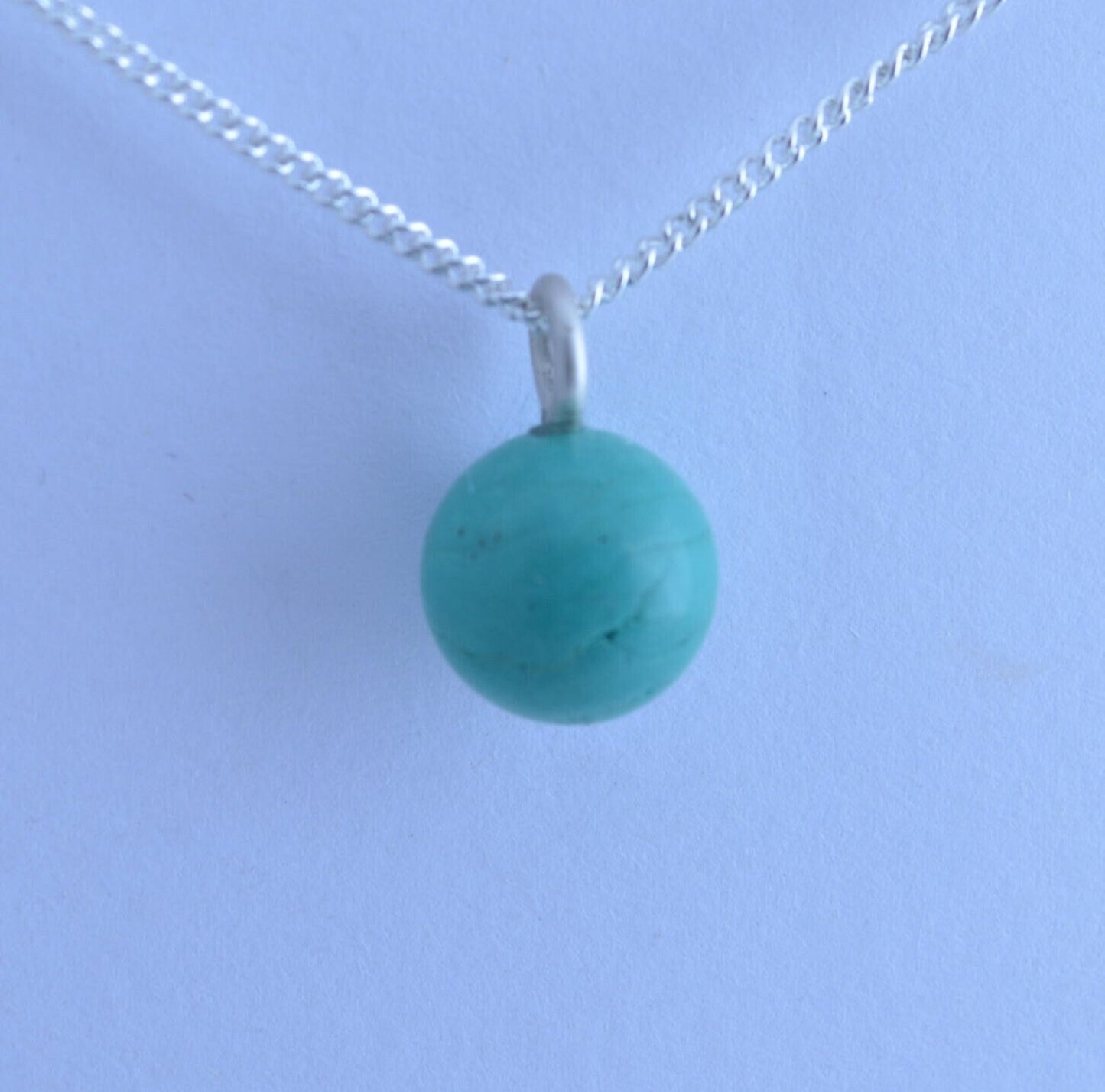 Silver turquoise charm necklace, round blue pendant, 18” chain