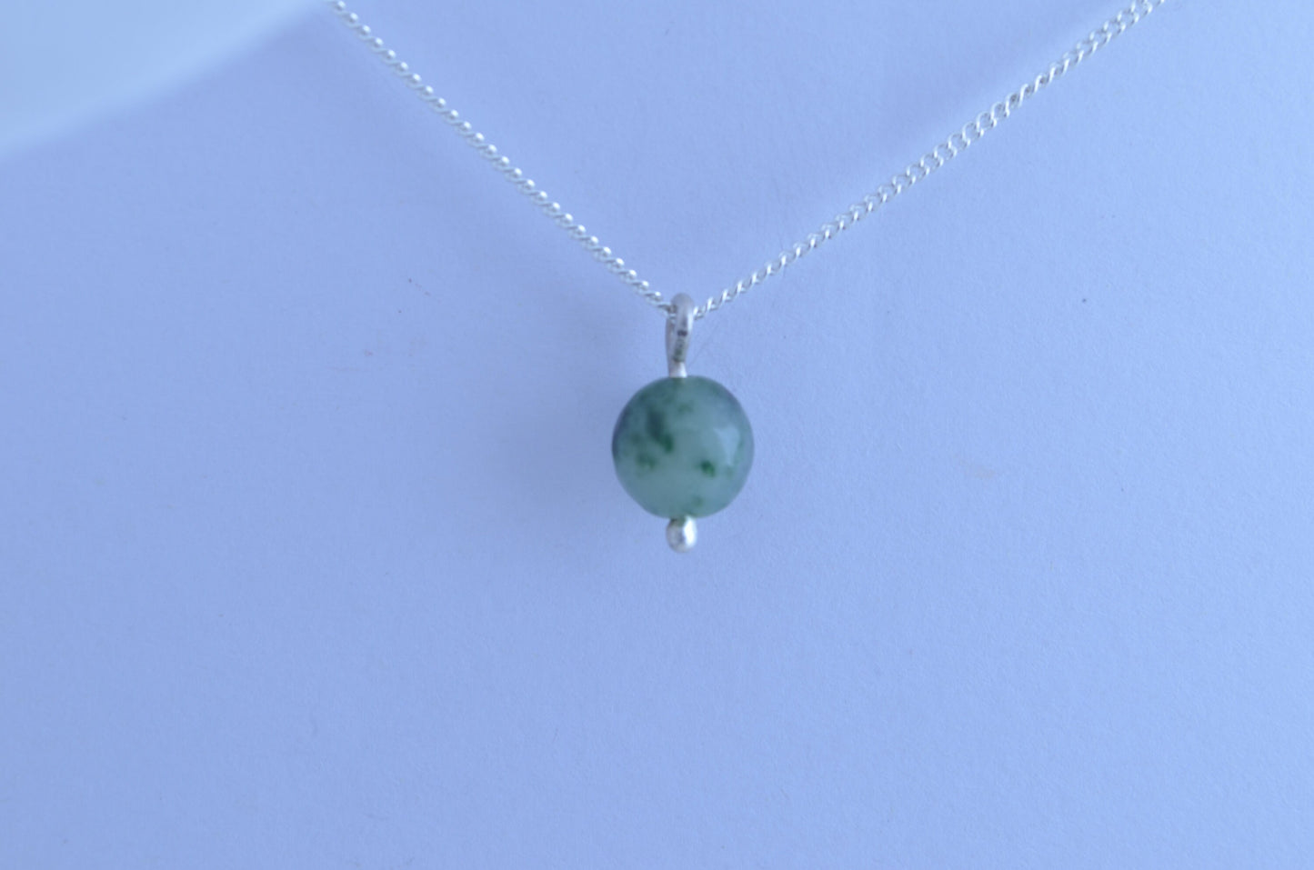 silver jade charm necklace, round spotted green pendant, natural gemstone, 18”chain