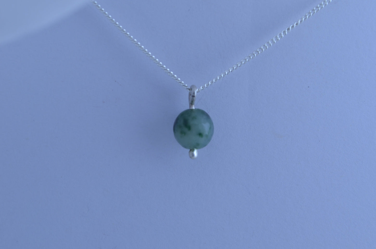 silver jade charm necklace, round spotted green pendant, natural gemstone, 18”chain