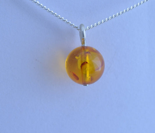 silver charm necklace, yellow amber pendant, round shape gemstone, 18” chain