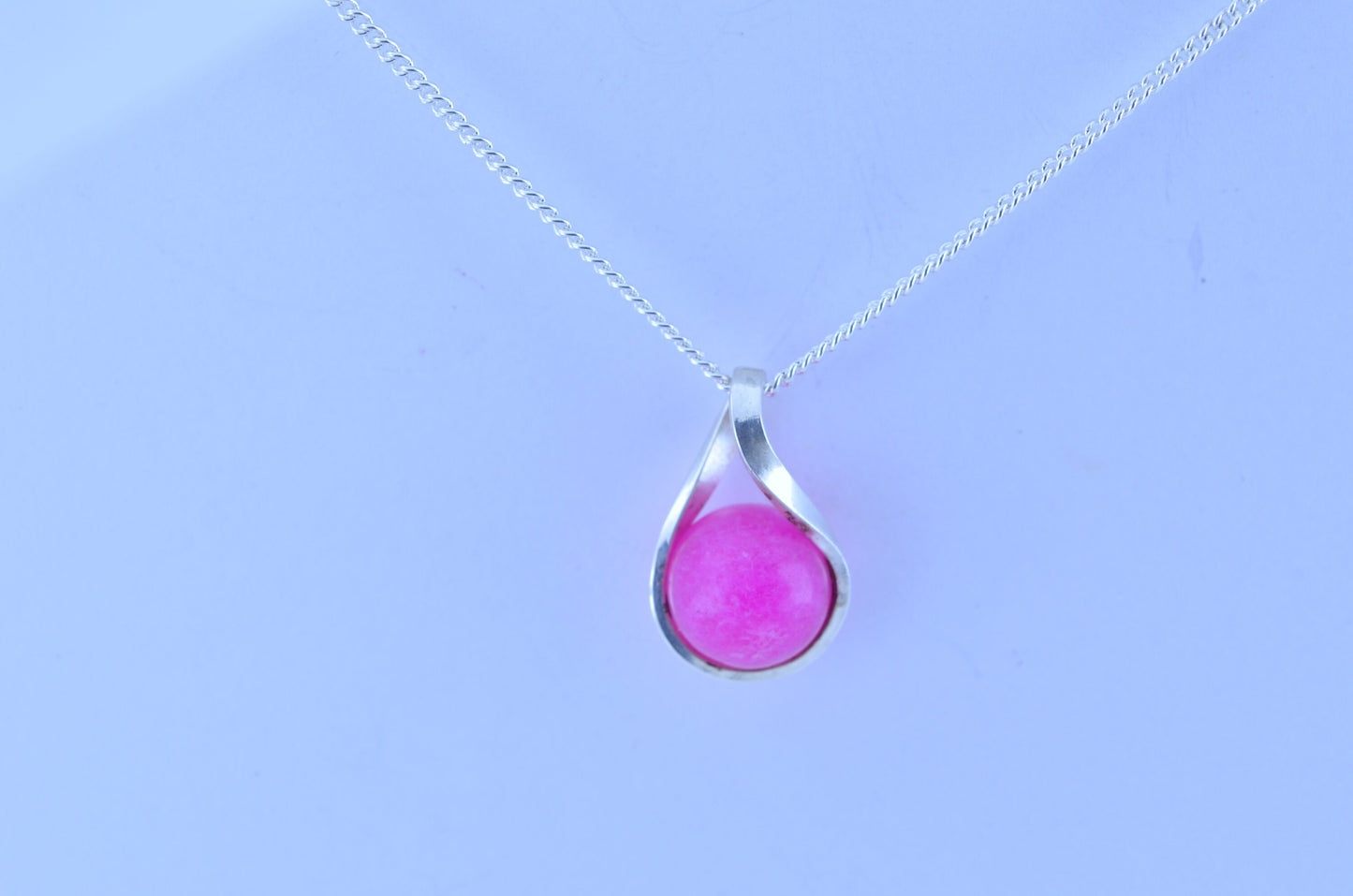 Silver pink jade necklace, twisted round stone pendant, 18” chain