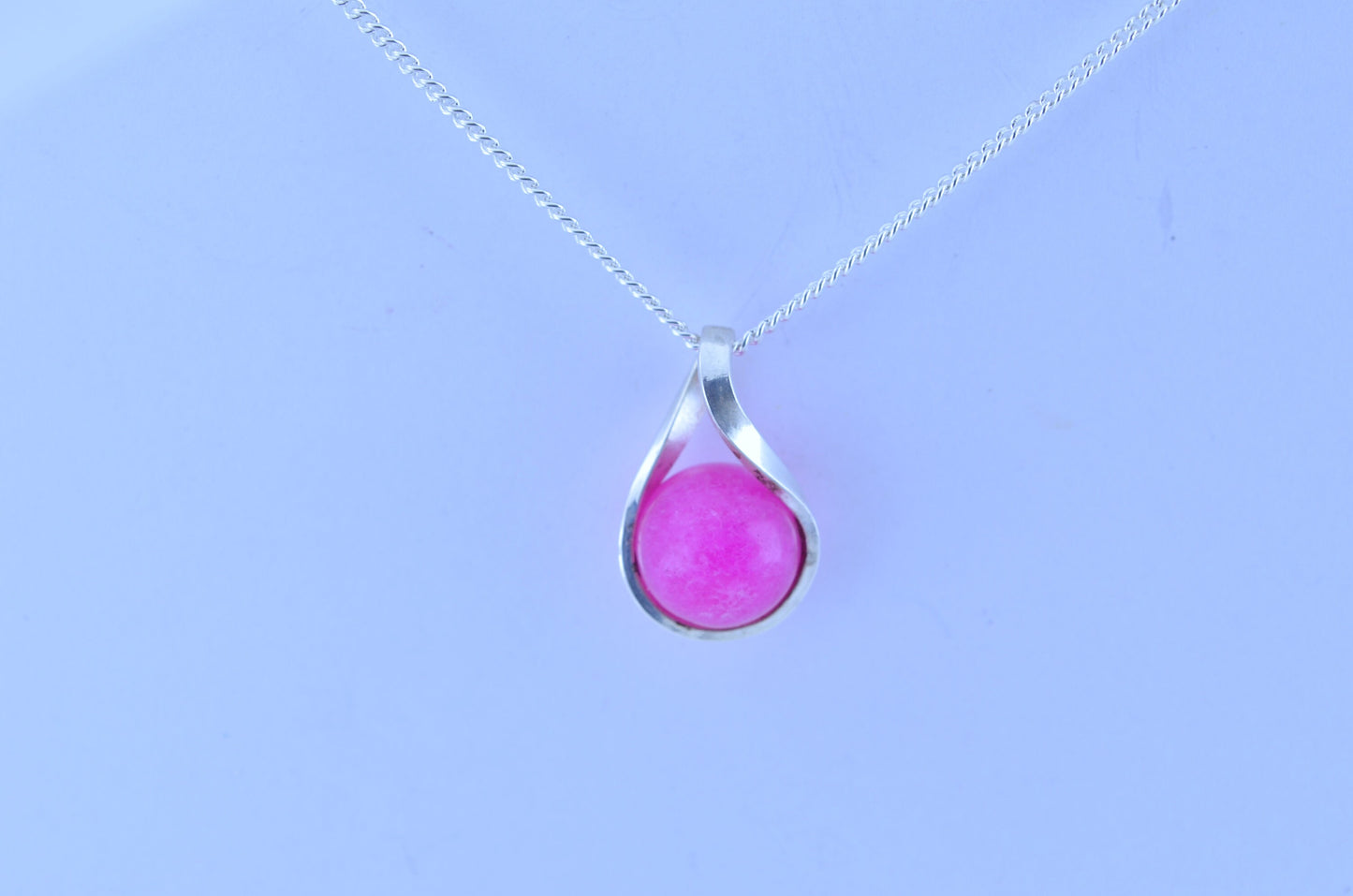 Silver pink jade necklace, twisted round stone pendant, 18” chain
