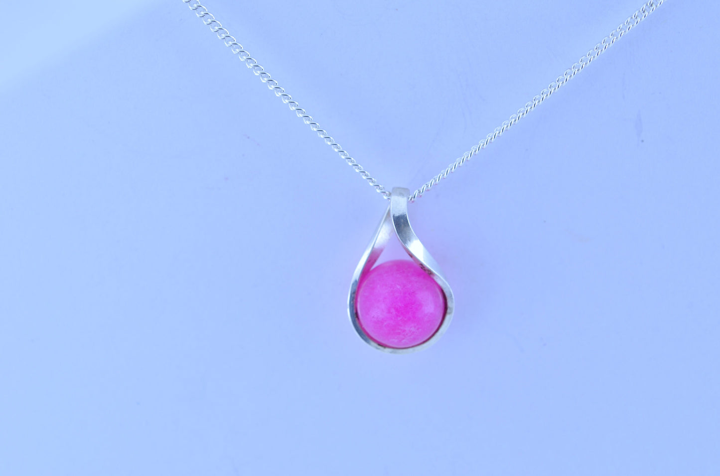 Silver pink jade necklace, twisted round stone pendant, 18” chain