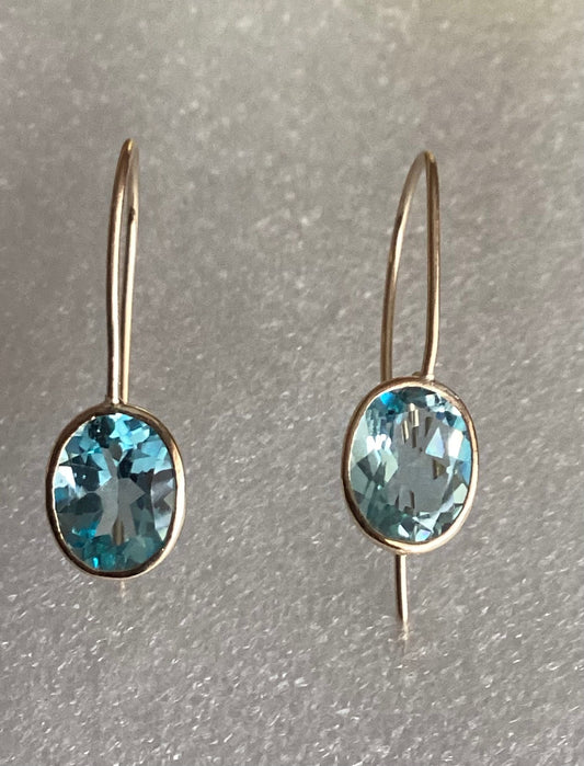 9ct gold blue topaz earrings, solid yellow gold, oval blue gemstones