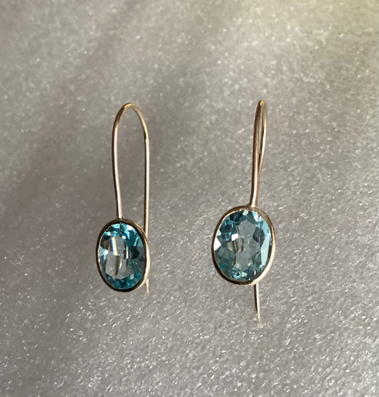 9ct gold blue topaz earrings, solid yellow gold, oval blue gemstones