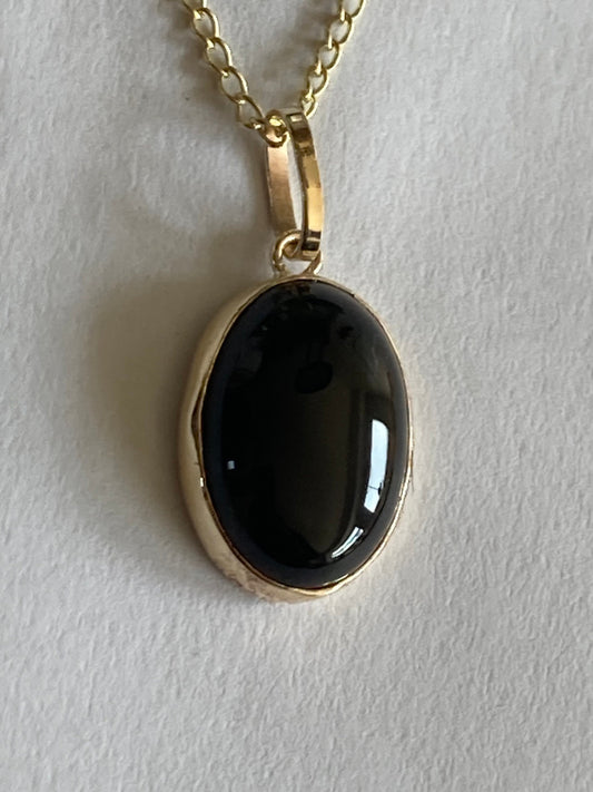 Gold black onyx pendant, solid 9ct yellow gold, natural oval black gemstone, 18”  chain