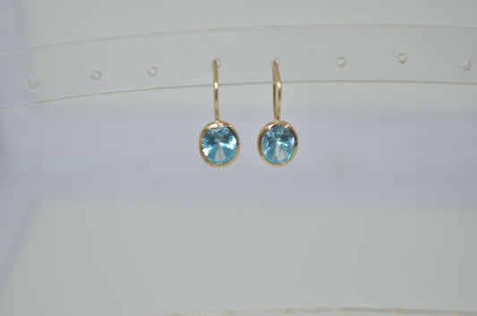 9ct gold earrings, blue Cubic zirconia, solid 9ct yellow gold