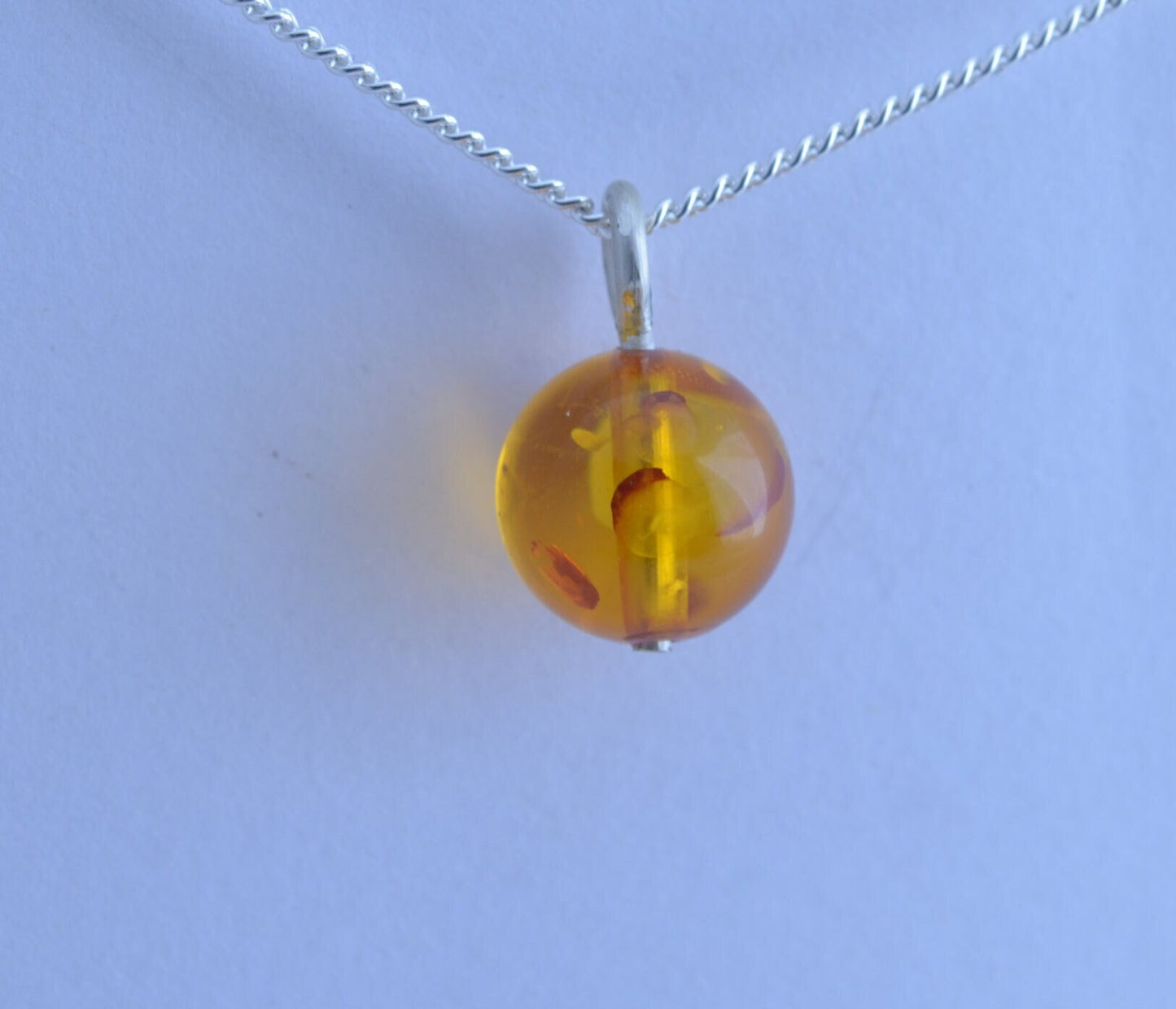 silver charm necklace, yellow amber pendant, round shape gemstone, 18” chain