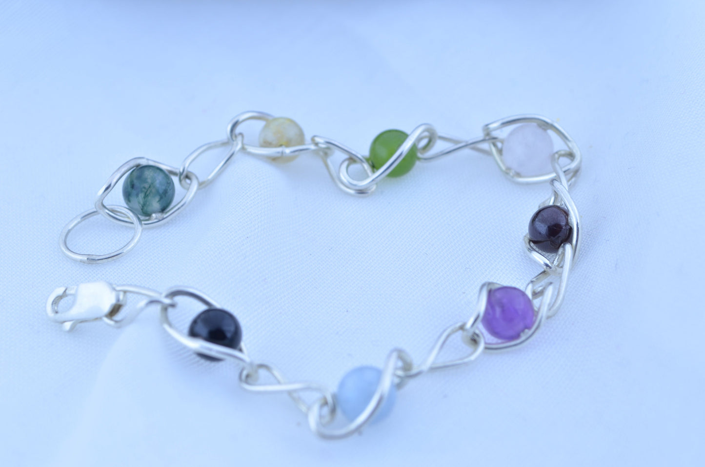 silver bracelet and natural gemstone, aquamarine, amethyst, black onyx, citrine, garnet, jade, moss agate, rose quartz