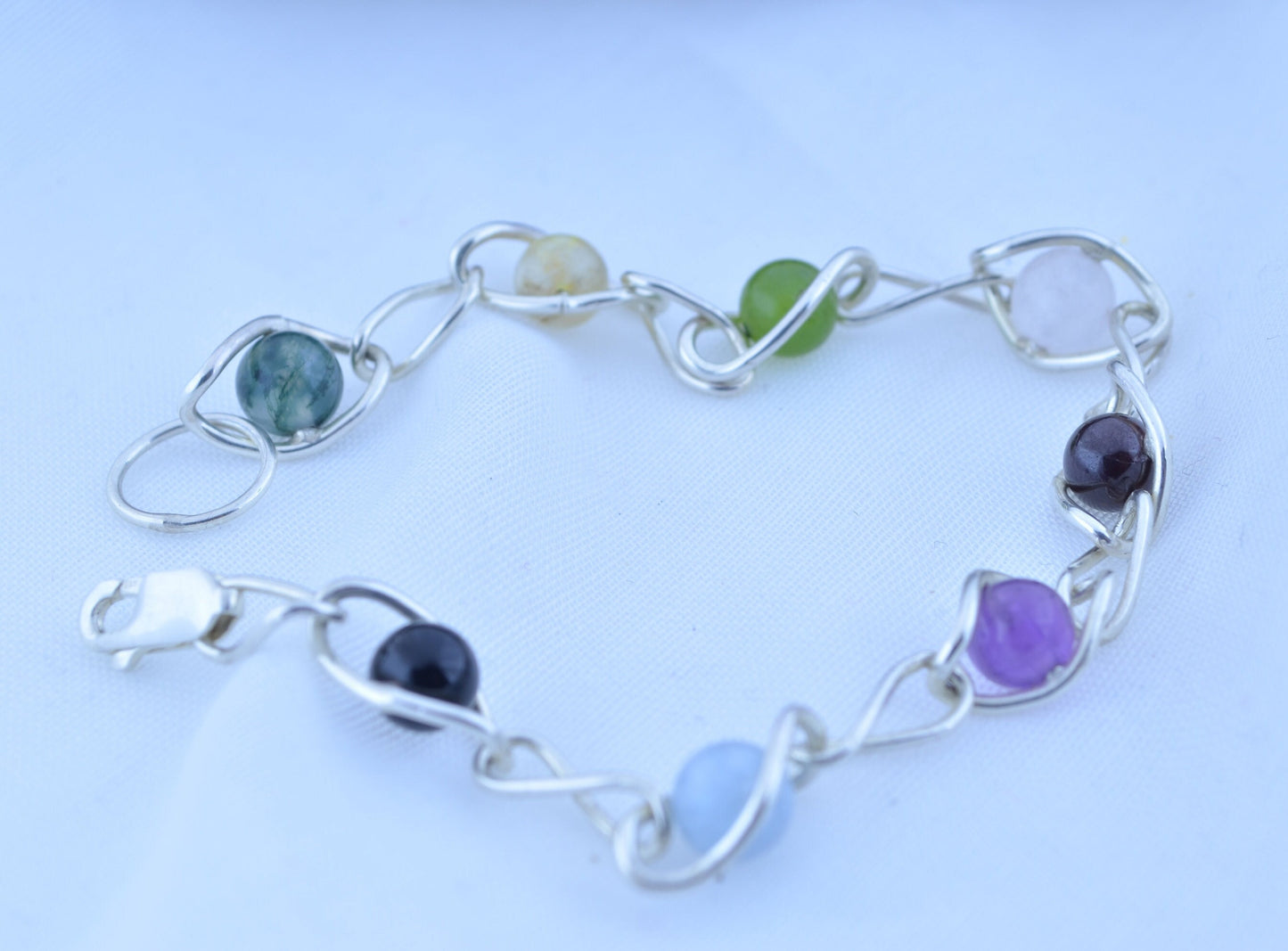 silver bracelet and natural gemstone, aquamarine, amethyst, black onyx, citrine, garnet, jade, moss agate, rose quartz